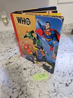 Front cover of binder with DC heroes artwork