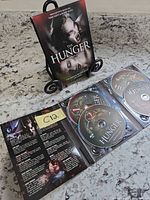 Front cover of The Hunger Complete 2nd Season DVD set on stand
