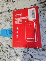 Front of red MPOW Wireless Music Receiver box