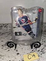 Front view of sealed Bobby Hull figure in clamshell
