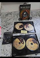 Outer sleeve, open case showing four discs and Starz insert