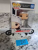 Front view of boxed Monica Geller Funko Pop in protector