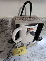Mug in open-front box showing handle, graphics, and top LED ZEPPELIN logo