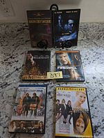 Front view of all six DVD cases closed