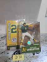 Front view of sealed Catfish Hunter action figure in packaging