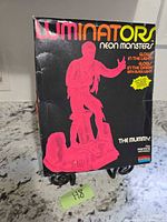 Front of the Pressman Luminators Neon Monsters box displaying product graphics