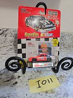 Front of sealed Racing Champions 1995 Edition Ricky Rudd #10 Tide die-cast car package