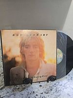 Front of album jacket with vinyl partially visible