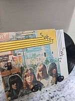 Front cover with record partially visible