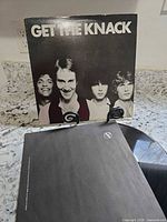 Front album cover and visible vinyl edge