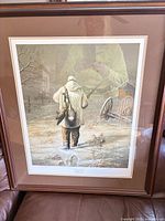 Full view of framed print showing artwork, matting, and frame