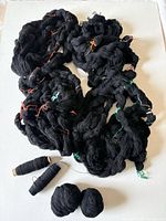 Overview of entire lot: loose skeins, two spindles, two balls