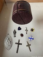 Group shot of jewelry box and all pendants/pins