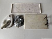 All four marble items laid out