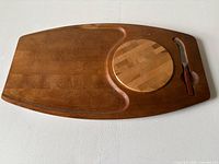 Full view of Barbiocraft wood cheese board with inset maple board and knife