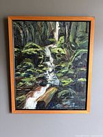 Full view of framed oil painting