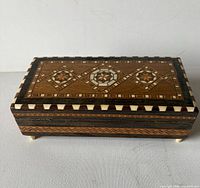 Top view showing geometric marquetry design