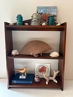 overall view of shelf and all objects