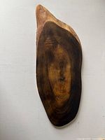 Full view of live edge wood platter showing shape and grain