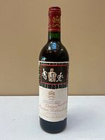 Front view of sealed 1994 Chateau Mouton Rothschild bottle showing full label and capsule