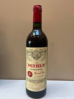 Full front view of sealed 1994 Chateau Petrus bottle showing label and fill level