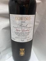 Front view of bottle showing label with vintage, producer, DOCG, volume and ABV