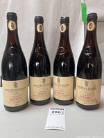 Front view of four Bersano wine bottles showing labels