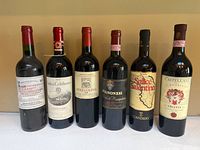 Front view of all six wine bottles