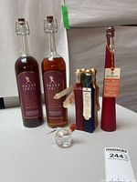 Group shot of all eight Italian liqueur and grappa bottles