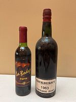 Front view of both port bottles displaying labels and overall condition
