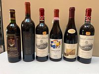 Group shot all six wine bottles front labels visible