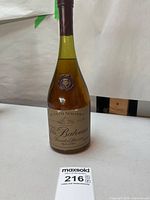 Full view of sealed bottle showing label and fill level