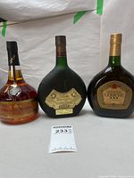 All three Armagnac bottles front view