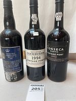 Front view of all three vintage port bottles