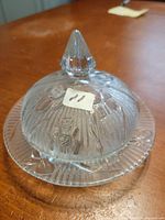 Covered butter dish assembled, showing lid, finial, and plate