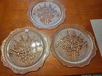 Top view of all three Iris & Herringbone dinner plates on table