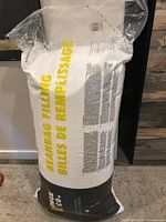 Full view of sealed 100-L bag labeled Beanbag Filling