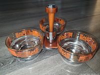 Top view of three glass bowls on metal base