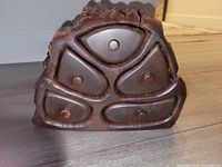 Front view showing five drawers with round pulls