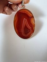 Front view showing agate pattern and silver bezel