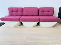 Front view of three connected modules forming sofa