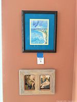 Both frames mounted on wall