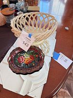Tray, bowl, mirrors grouped on table