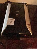 Top view of Canon CanoScan 9000F scanner with lot sticker visible