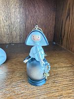 Porcelain nun figurine with hanging loop