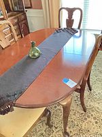 oval cherry dining table with chairs