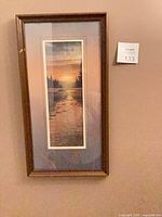 Full view of framed print on wall