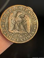 Reverse of coin showing eagle on thunderbolt, legends and A mintmark
