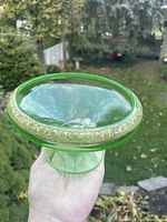 Side view showing apple green compote on pedestal and gold gilt band