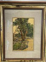 Full view of framed artwork showing frame, matting and image